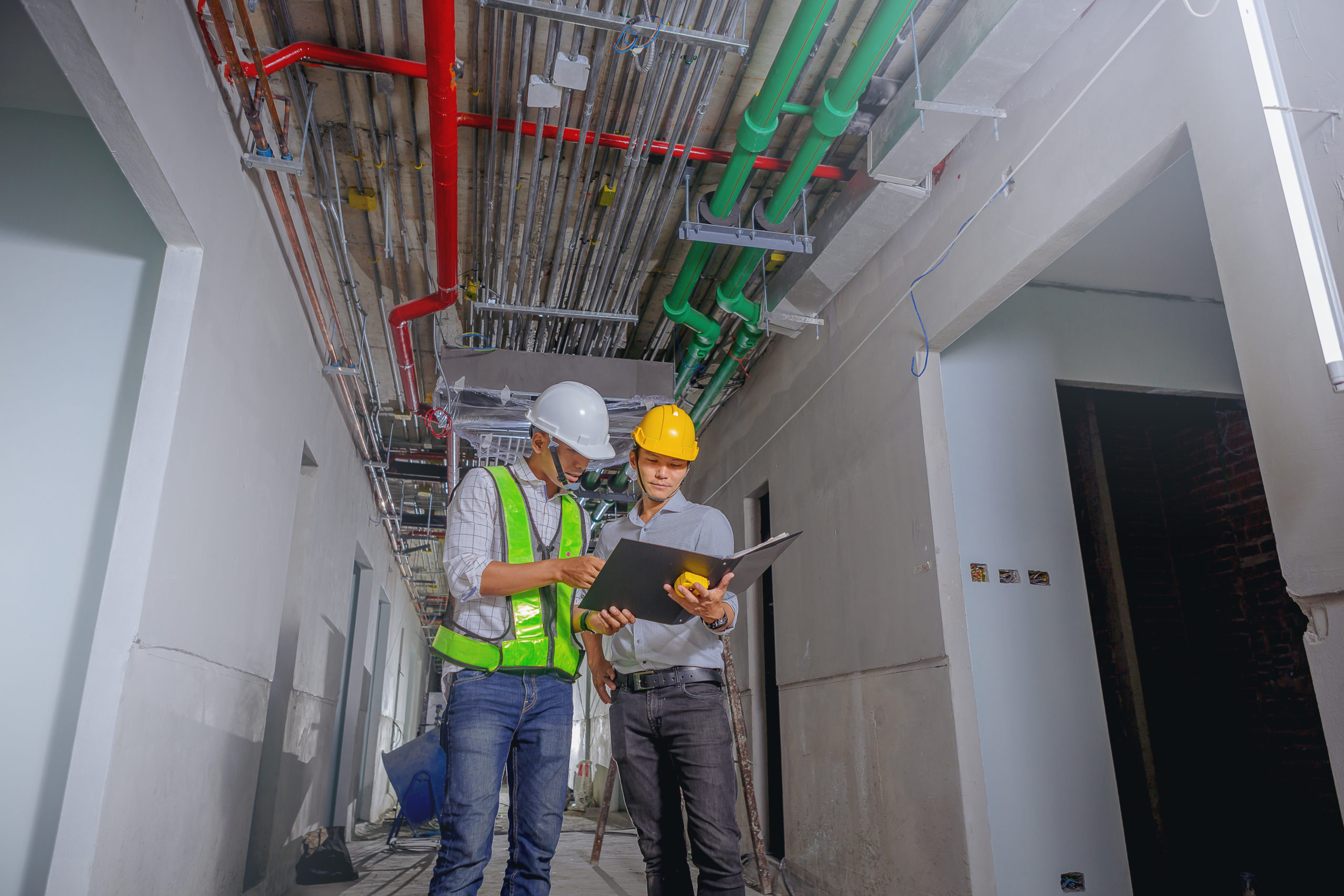 Line electrician builder engineer and worker with the blueprint Cabling Design